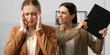 woman feels stressed by toxic boss 